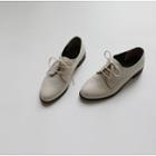 Oval-toe Oxfords