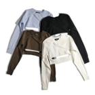 Long-sleeve Irregular Plain Cut-out Knit Top