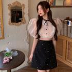 Puff-sleeve Ruffle Sheer Blouse / Rhinestone Mini A-line Skirt