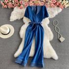 V-neck Tie-waist Denim Boot-cut Jumpsuit