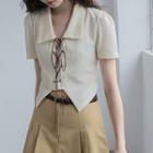Short-sleeve Lace-up Polo Knit Top