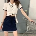 Short-sleeve Contrast Trim Polo Shirt / High-waist Striped Skirt