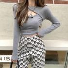 Long-sleeve Cut-out Crop Top / Patterned Wide-leg Pants