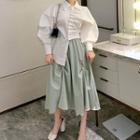 Lantern-sleeve Ruffled Shirt / High-waist Chain Accent Skirt