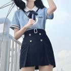 Short Sleeve Bow Accent Shirt / High Waist Mini Skirt