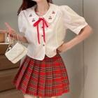 Short-sleeve Embroidered Shirt / Pleated Check Skirt