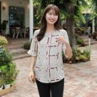 Round-neck Flare-cuff Patterned Blouse
