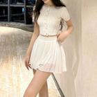 Short-sleeve Cable-knit Cropped Cardigan / Mini Pleated Skirt