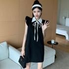 Sleeveless Collared Ruffle Trim Tie Neck A-line Dress