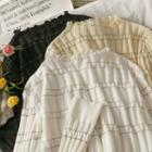 Ruffled-edge Bell-sleeve Smocked Sweater