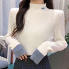 Long-sleeve Heart Embroidered Mock-neck Knit Top