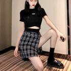 Lettering Cutout Short-sleeve Crop Top / Plaid Mini Skirt