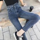 Asymmetrical High-waist Skinny Jeans