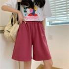Moon Embroidered Elastic-waist Shorts