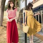 Set: Cap-sleeve Plaid Top + A-line Midi Skirt