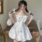 Chain Spaghetti Strap Bow-front Embossed Mini A-line Dress