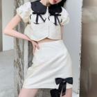 Puff-sleeve Collar Crop Top / Ribbon Mini A-line Skirt