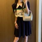 Short-sleeve Lettering Polo Knit Top / Pleated A-line Skirt