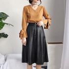 Tie-sleeve V-neck Knit Top / A-line Faux Leather Skirt