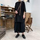 3/4-sleeve Asymmetric Long T-shirt Black - One Size