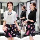 Set: Perforated Short-sleeve Top + Print A-line Skirt