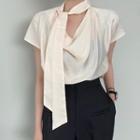 Short-sleeve Tie-neck Cutout Blouse