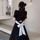 Short-sleeve Cutout Bow Midi A-line Dress