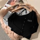 Asymmetrical Letter Embroidered Knit Top
