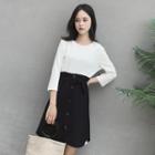 Set: Plain 3/4-sleeve T-shirt + Buttoned A-line Skirt