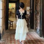 Short-sleeve T-shirt / Tiered Midi Skirt