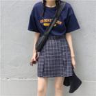 Lettering Short-sleeve T-shirt / Plaid Mini A-line Skirt / Set