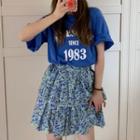 Short-sleeve Lettering T-shirt / Floral Mini A-line Skirt