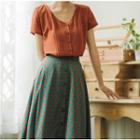 Set: V-neck Short-sleeve Blouse + Printed Midi A-line Skirt