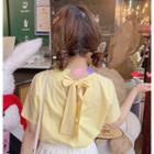 Bow Short-sleeve T-shirt / Ruffle Mini Skirt