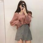 Cable-knit V-neck Sweater / Mini A-line Skirt