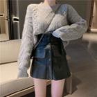 Cable Knit Sweater / Mini A-line Faux Leather Skirt