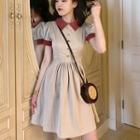 Short-sleeve Contrast Trim Buttoned A-line Mini Dress