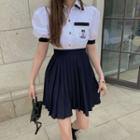 Set: Puff-sleeve Contrast Trim Cropped Top + Plain Pleated A-line Skirt