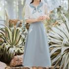 Set: Short-sleeve Floral Embroidered Blouse + Midi A-line Skirt