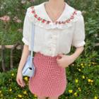 Floral Short-sleeve Shirt / Plaid A-line Skirt
