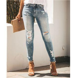 Low-rise Ripped Jeans