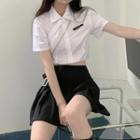 Short-sleeve Crop Shirt / Pleated Mini Skirt