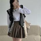 Long-sleeve T-shirt / Striped Sweater Vest / Pleated A-line Skirt
