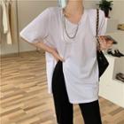 Short Sleeve Chain Detail Slit T-shirt/ High Waist Boot Cut Pants