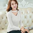 Round Buckle Ribbed Long-sleeve Knit Top