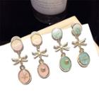 Non-matching Bow Disc Drop Earring