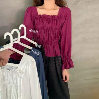 Long-sleeve Shirred Peplum Top