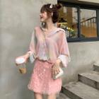 Tie-dye Shirt / Sequined Mini Skirt