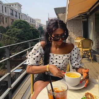 Off-shoulder Dotted Smocked Top