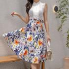 Set: Sleeveless Blouse + Floral Print A-line Skirt